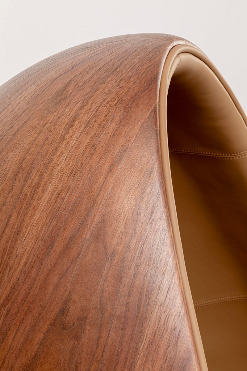 Eye Ball Walnut Swivel Armchair