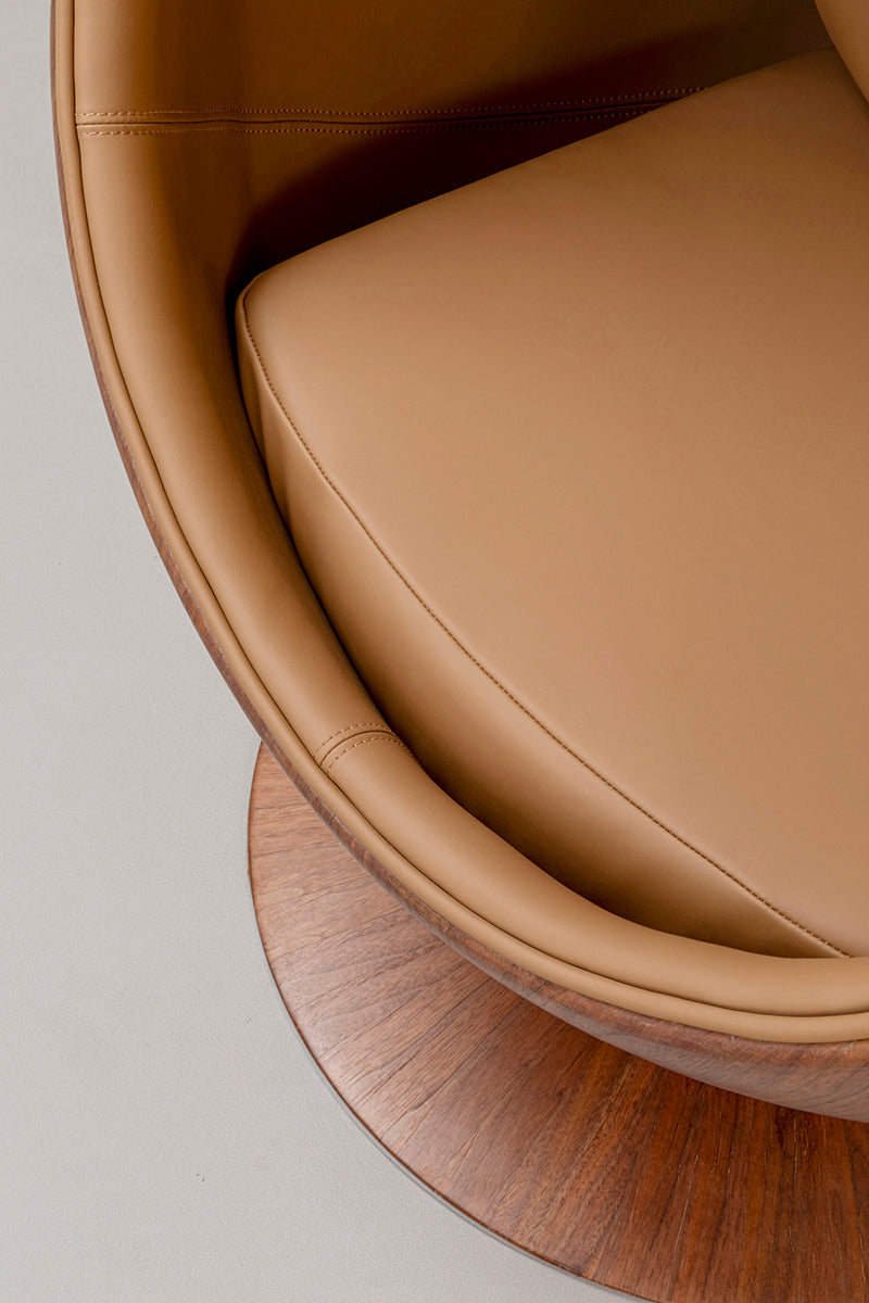 Eye Ball Walnut Swivel Armchair