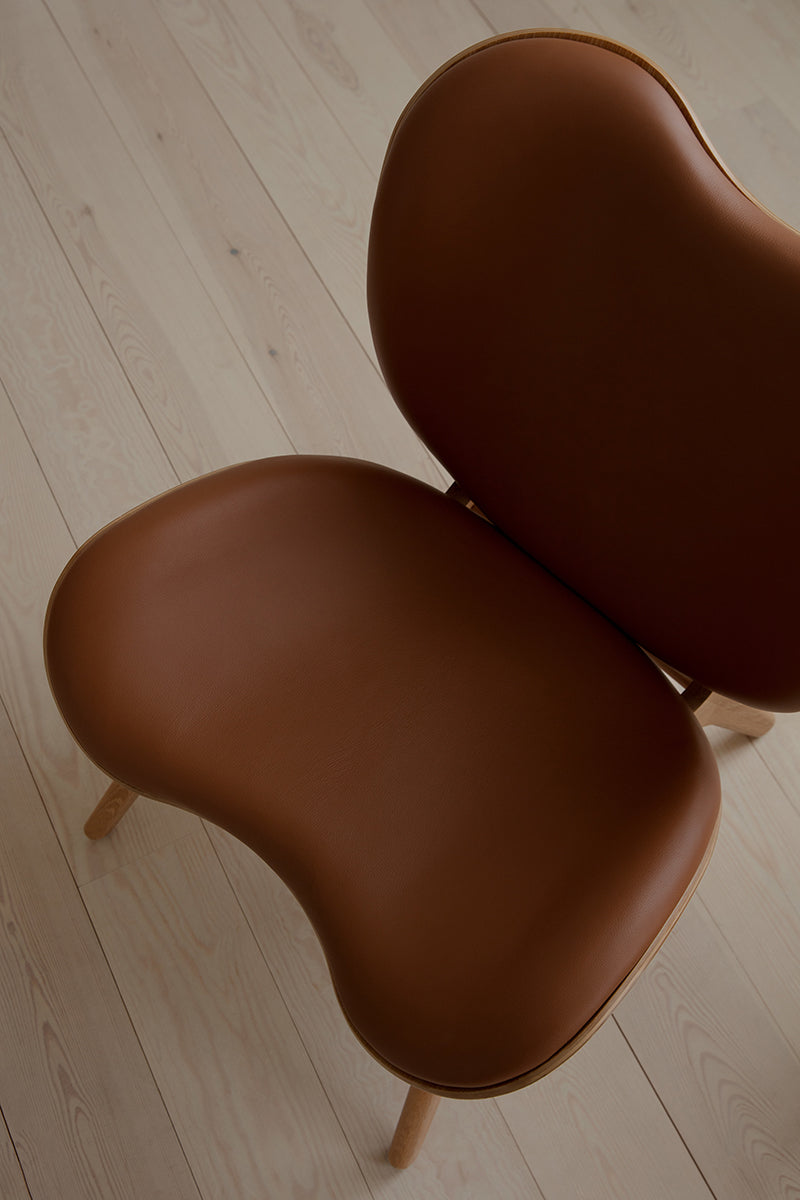A Conversation Piece Leather Low Lounge Chair - WOO .Design