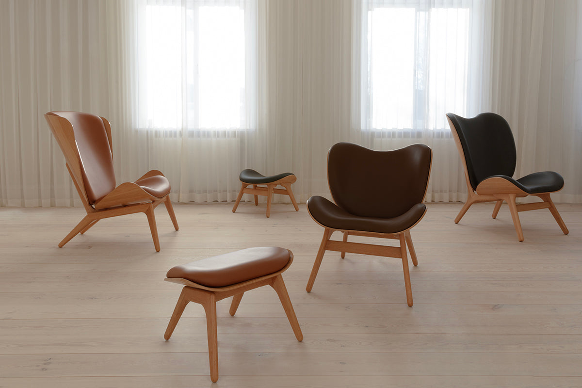 A Conversation Piece Leather Ottoman - WOO .Design