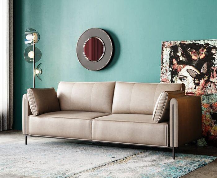 Teal green leather deals sofa